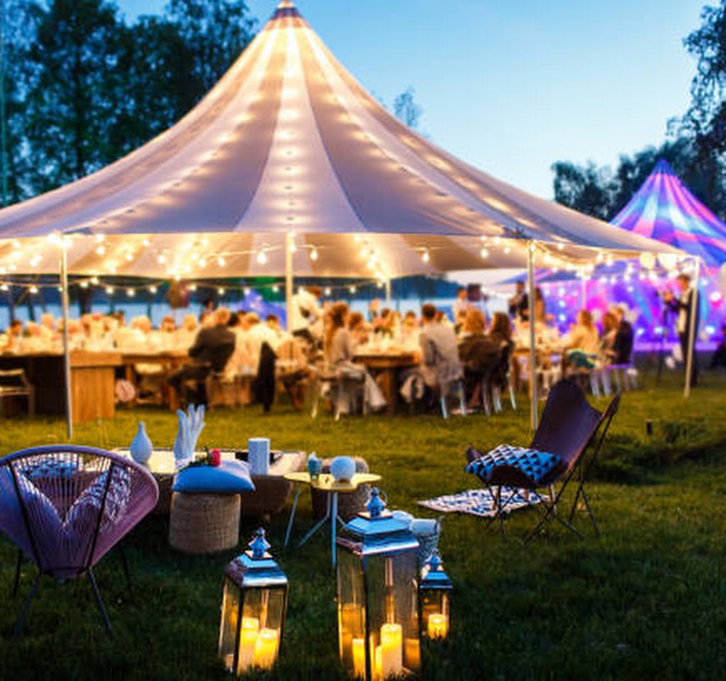 Colorful wedding tents at night. Wedding day.